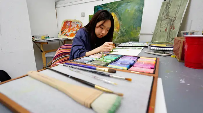 A CMU art student working on a project.